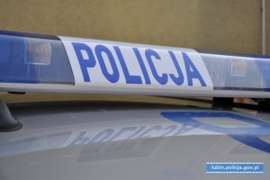 Napis na belce radiowozu Policja