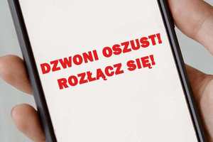 Ekran telefonu i napis o treści dzwoni oszust rozłącz się