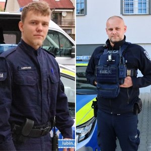 Policjanci przy radiowozach